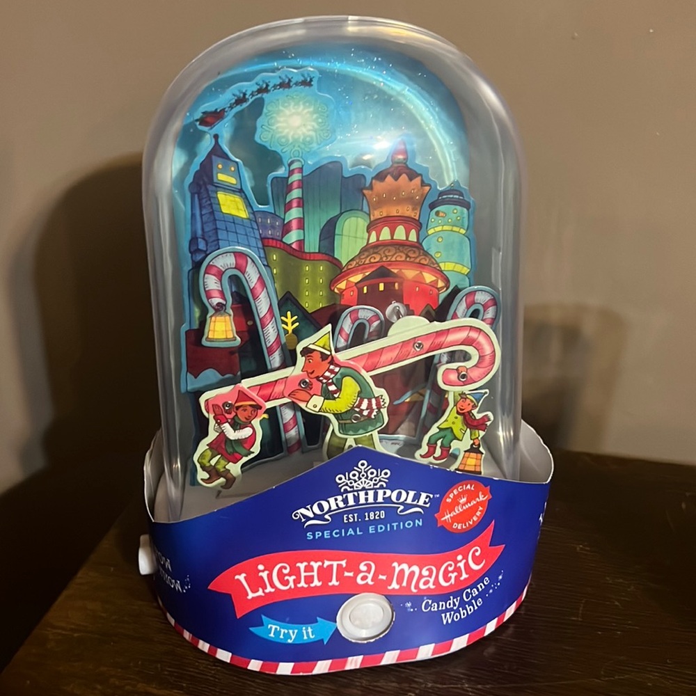 New Hallmark Light-a-magic candy cane wobble
